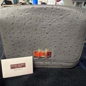 Henri Bendel Dalton Ostrich Messenger Bag
Dark Grey